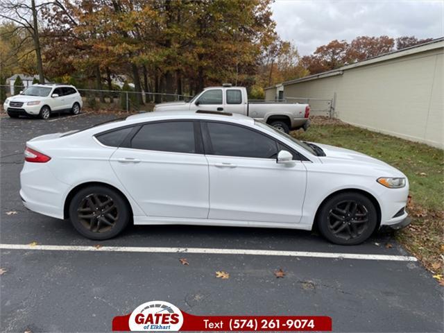 used 2014 Ford Fusion car, priced at $14,000