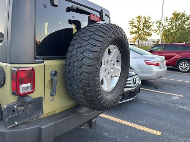 used 2013 Jeep Wrangler Unlimited car, priced at $13,900