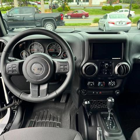 used 2016 Jeep Wrangler Unlimited car, priced at $25,990