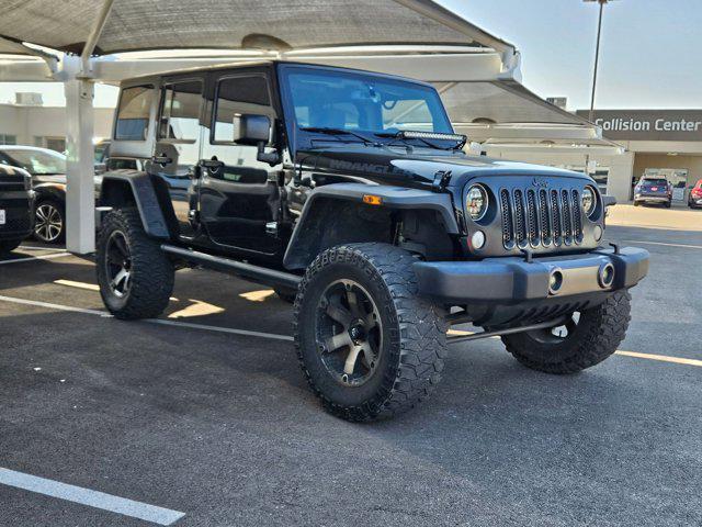 used 2016 Jeep Wrangler Unlimited car, priced at $23,990