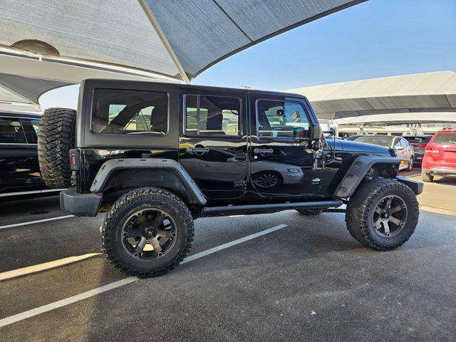 used 2016 Jeep Wrangler Unlimited car, priced at $23,990