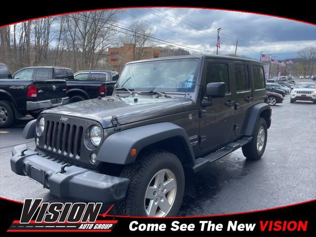 used 2018 Jeep Wrangler JK Unlimited car, priced at $27,427