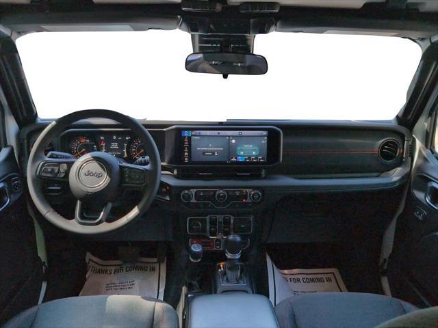 used 2024 Jeep Wrangler car, priced at $43,214