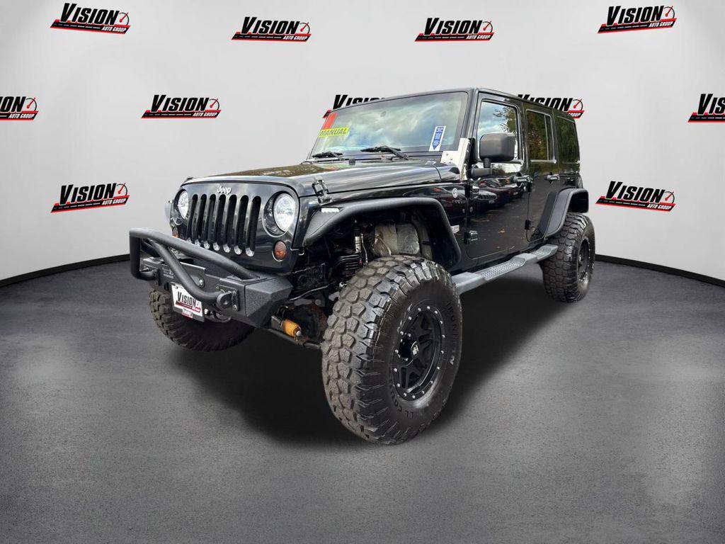 used 2011 Jeep Wrangler Unlimited car, priced at $15,000