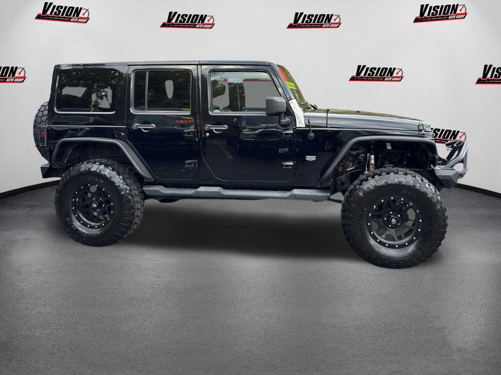 used 2011 Jeep Wrangler Unlimited car, priced at $15,000