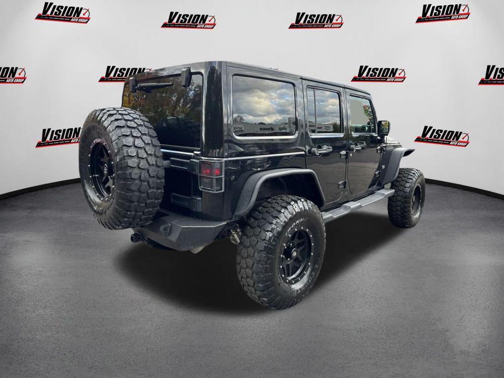 used 2011 Jeep Wrangler Unlimited car, priced at $15,000