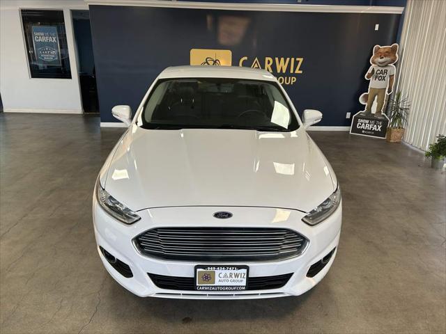 used 2014 Ford Fusion Energi car, priced at $8,288