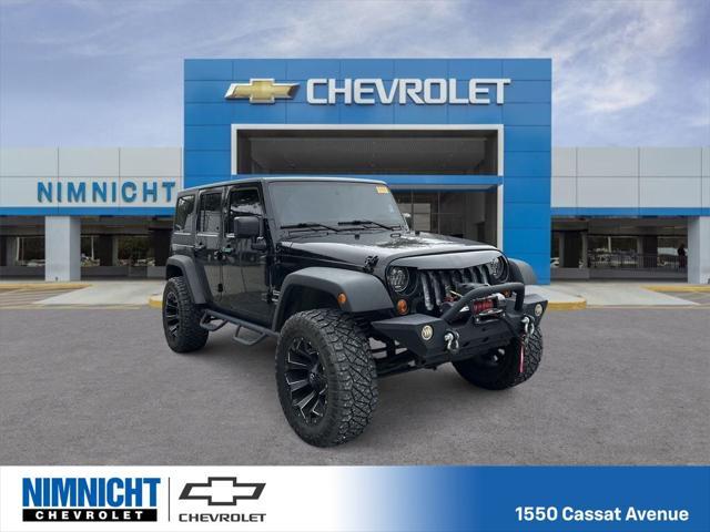 used 2013 Jeep Wrangler Unlimited car, priced at $13,495