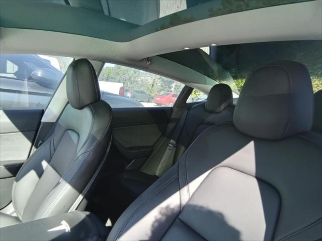 used 2023 Tesla Model 3 car, priced at $29,999