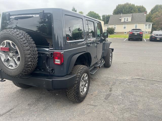 used 2017 Jeep Wrangler Unlimited car, priced at $25,772