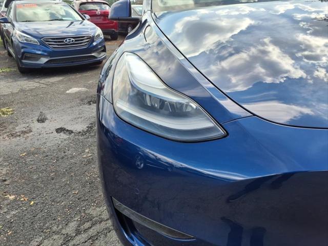 used 2022 Tesla Model Y car, priced at $28,999