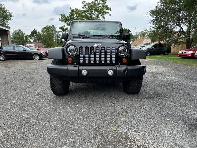 used 2011 Jeep Wrangler car, priced at $12,916