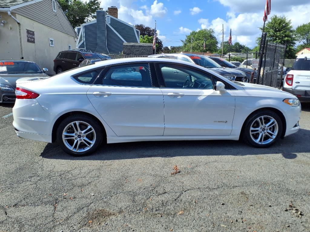 used 2016 Ford Fusion Hybrid car, priced at $9,999