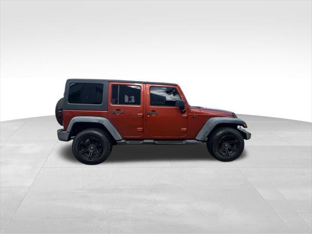 used 2014 Jeep Wrangler Unlimited car, priced at $16,995