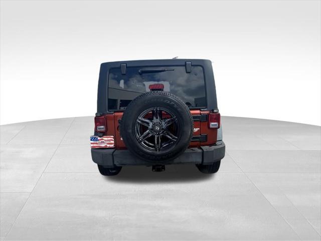 used 2014 Jeep Wrangler Unlimited car, priced at $16,995