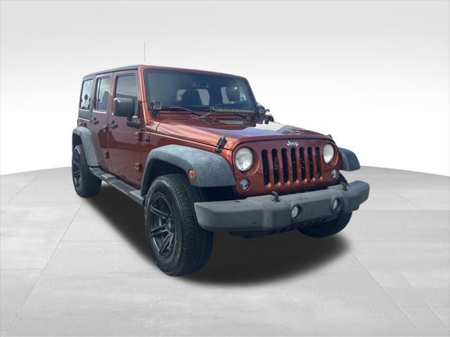 used 2014 Jeep Wrangler Unlimited car, priced at $16,995