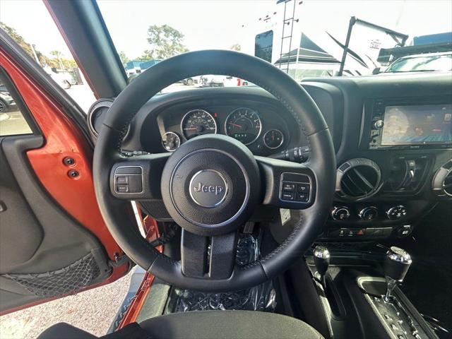 used 2014 Jeep Wrangler Unlimited car, priced at $16,995