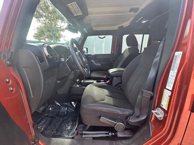 used 2014 Jeep Wrangler Unlimited car, priced at $16,995