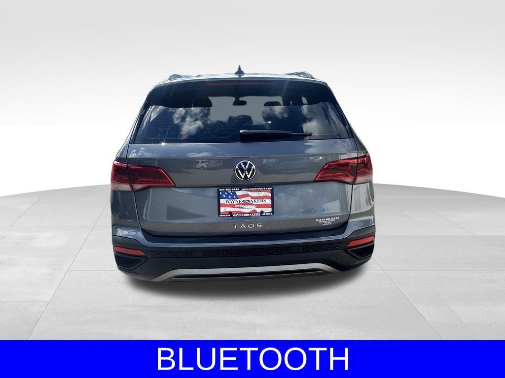 used 2023 Volkswagen Taos car, priced at $18,638