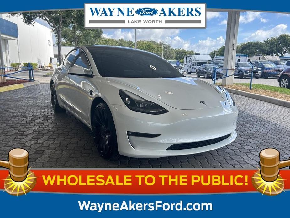 used 2023 Tesla Model 3 car, priced at $35,720