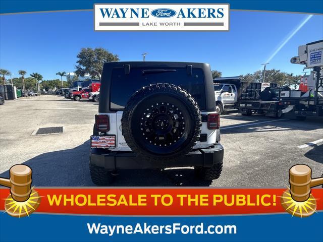 used 2015 Jeep Wrangler Unlimited car, priced at $18,995