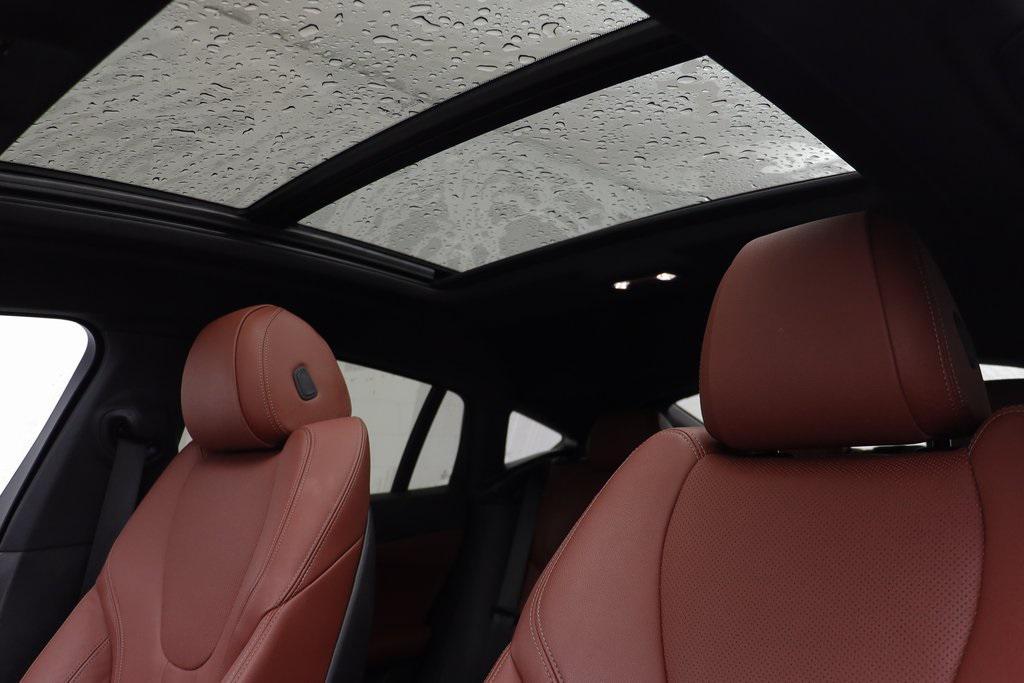 used 2022 BMW X6 car, priced at $54,062