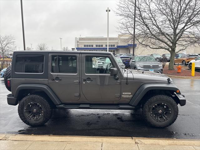 used 2014 Jeep Wrangler Unlimited car, priced at $17,331