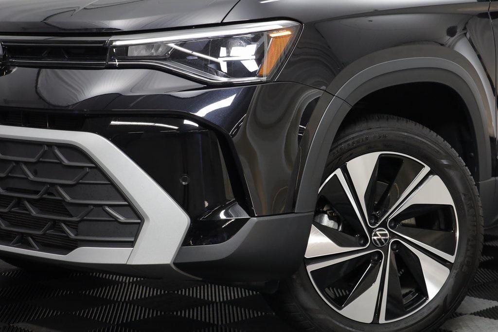 used 2025 Volkswagen Taos car, priced at $25,262