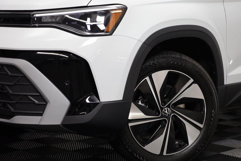 new 2025 Volkswagen Taos car, priced at $28,663