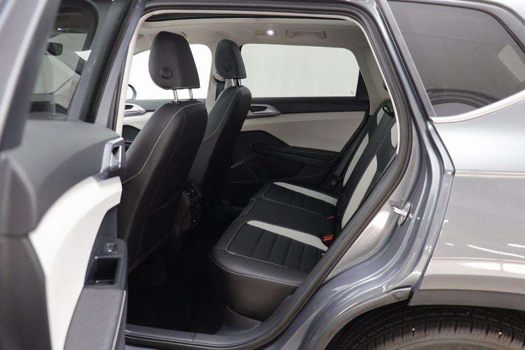 used 2025 Volkswagen Taos car, priced at $31,355