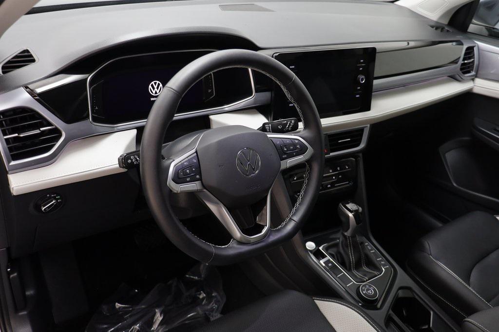 used 2025 Volkswagen Taos car, priced at $31,355
