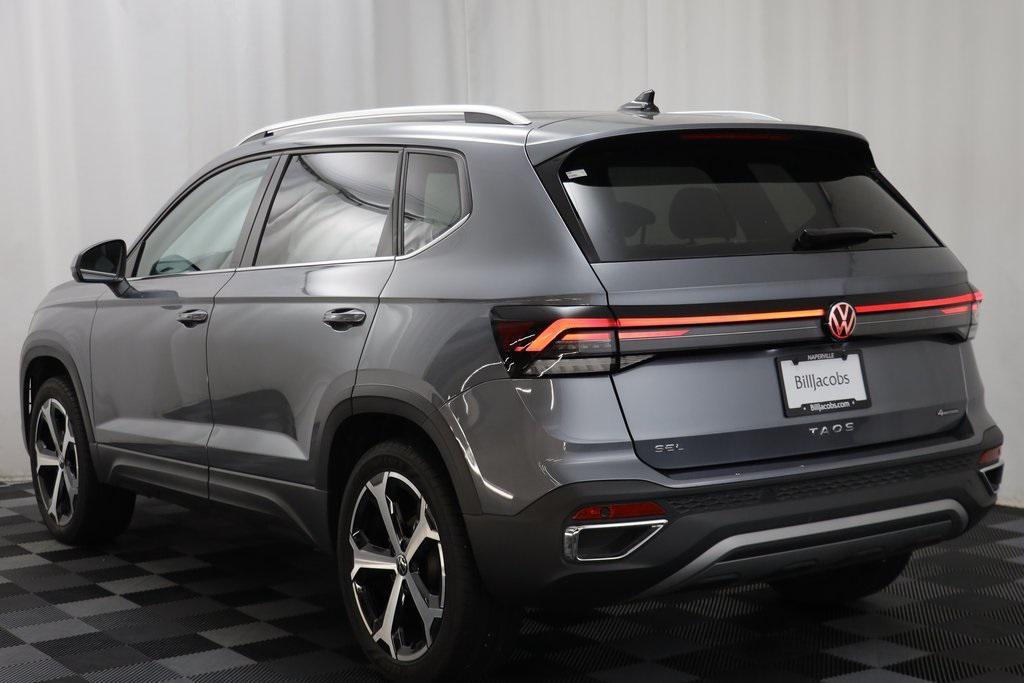 used 2025 Volkswagen Taos car, priced at $31,355
