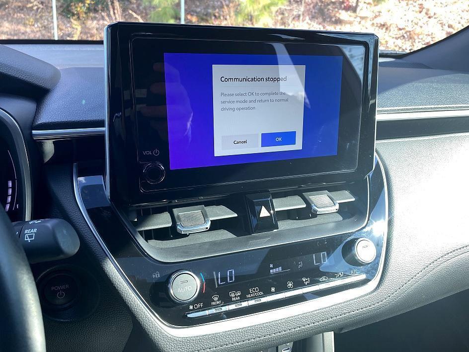 used 2024 Toyota Corolla Cross Hybrid car, priced at $31,896