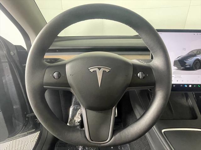 used 2024 Tesla Model Y car, priced at $46,000