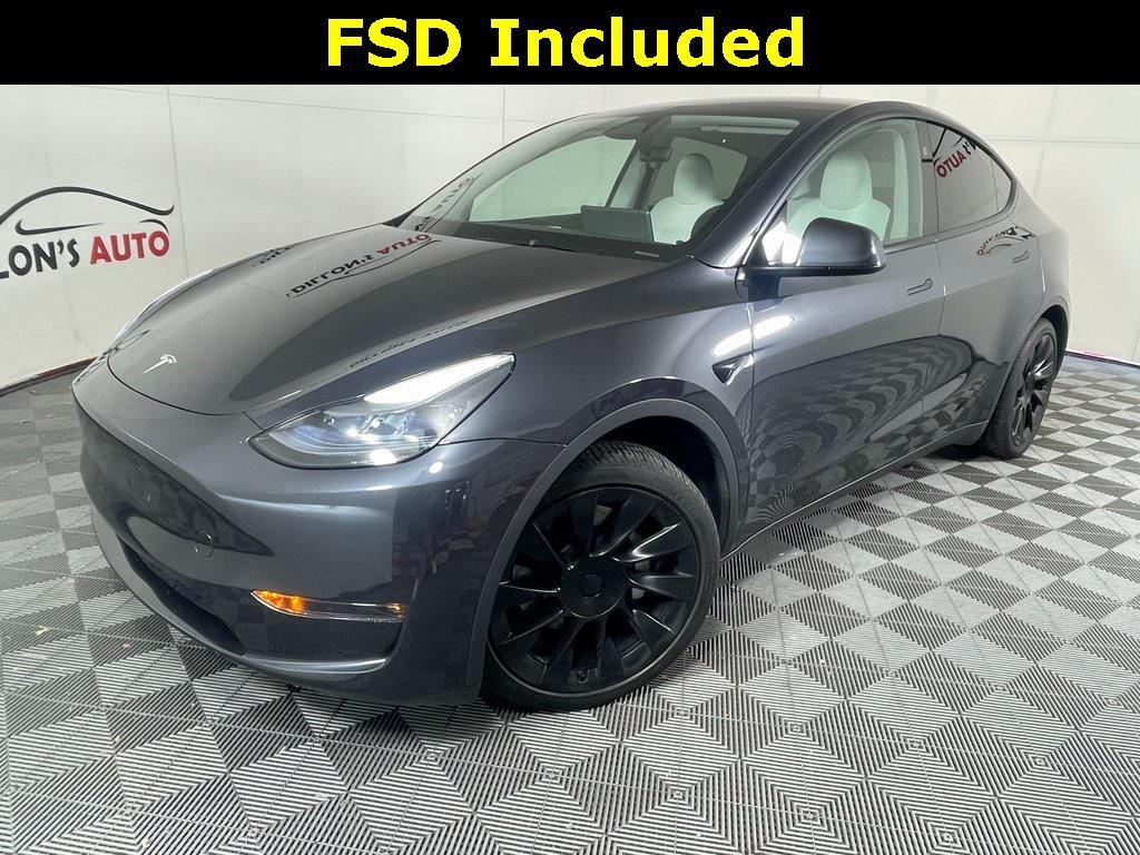 used 2025 Tesla Model Y car, priced at $42,980