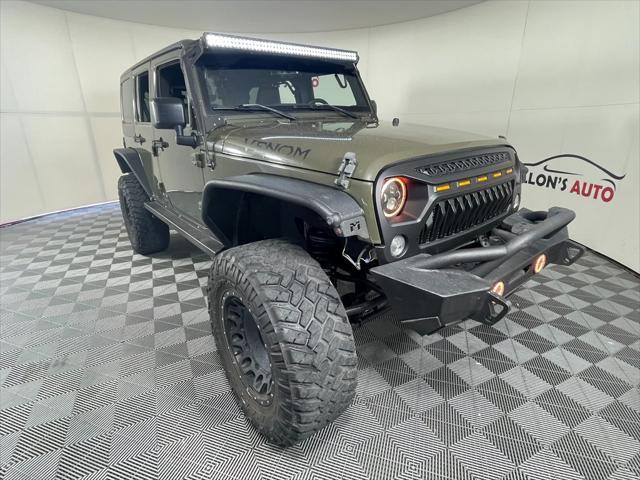 used 2016 Jeep Wrangler Unlimited car, priced at $32,980