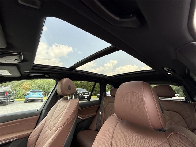 used 2024 BMW X5 car, priced at $55,999