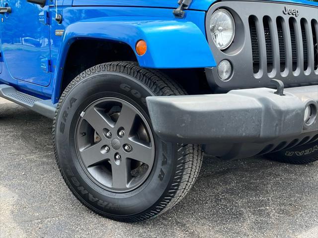 used 2016 Jeep Wrangler Unlimited car, priced at $19,329