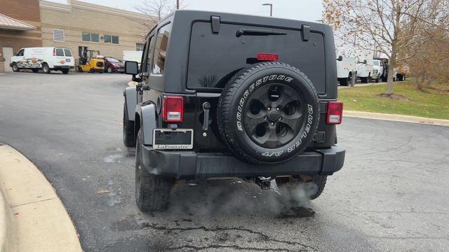 used 2014 Jeep Wrangler Unlimited car, priced at $11,495