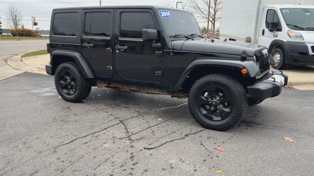 used 2014 Jeep Wrangler Unlimited car, priced at $11,495