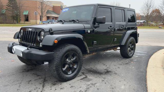 used 2014 Jeep Wrangler Unlimited car, priced at $11,495