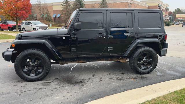 used 2014 Jeep Wrangler Unlimited car, priced at $11,495