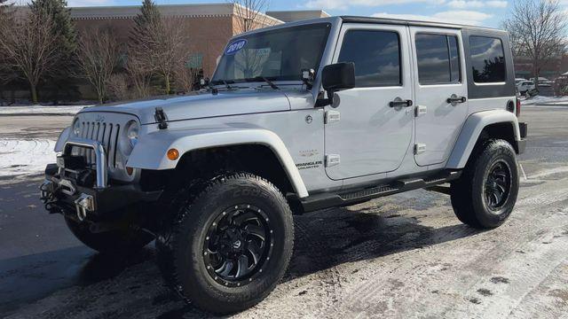 used 2010 Jeep Wrangler Unlimited car, priced at $15,995