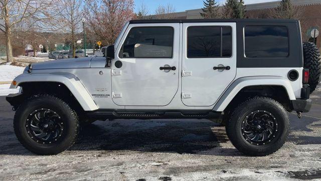 used 2010 Jeep Wrangler Unlimited car, priced at $15,995