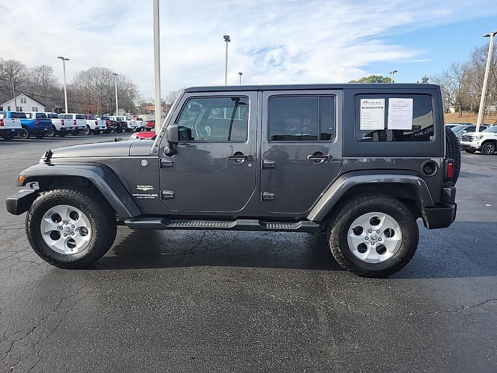 used 2014 Jeep Wrangler Unlimited car, priced at $15,817