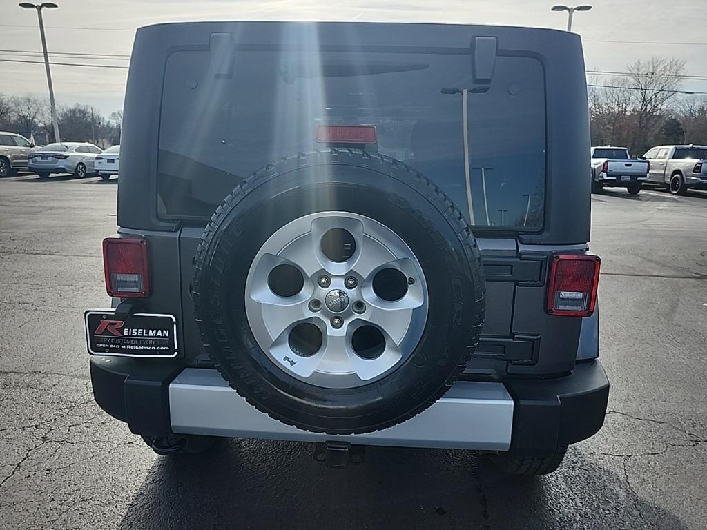 used 2014 Jeep Wrangler Unlimited car, priced at $15,817