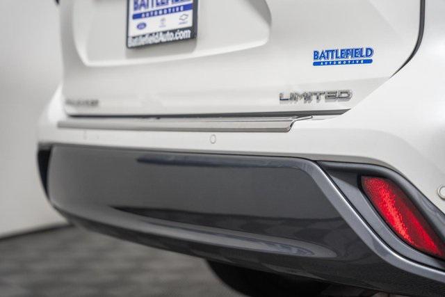 used 2021 Toyota Highlander Hybrid car, priced at $28,995