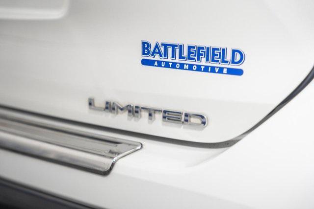 used 2021 Toyota Highlander Hybrid car, priced at $28,995