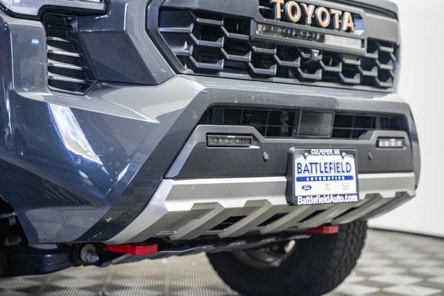 used 2025 Toyota Tacoma Hybrid car, priced at $57,999