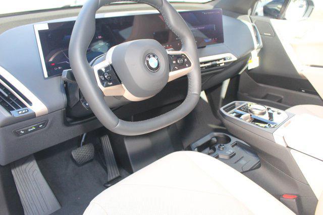 new 2026 BMW iX car, priced at $92,070